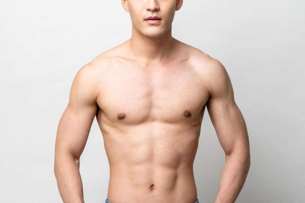 Healhty,Muscular,Upper,Body,Of,A,Shirtless,Man,Isolated,On